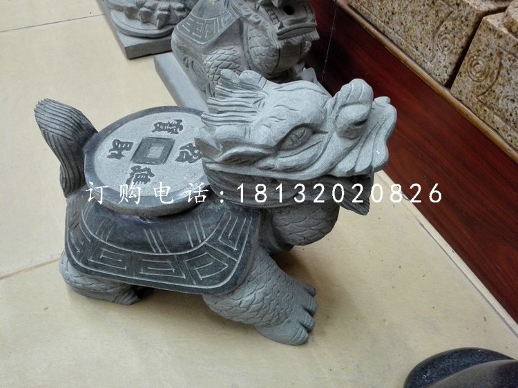 背著銅錢的龍龜石雕,青石龍龜